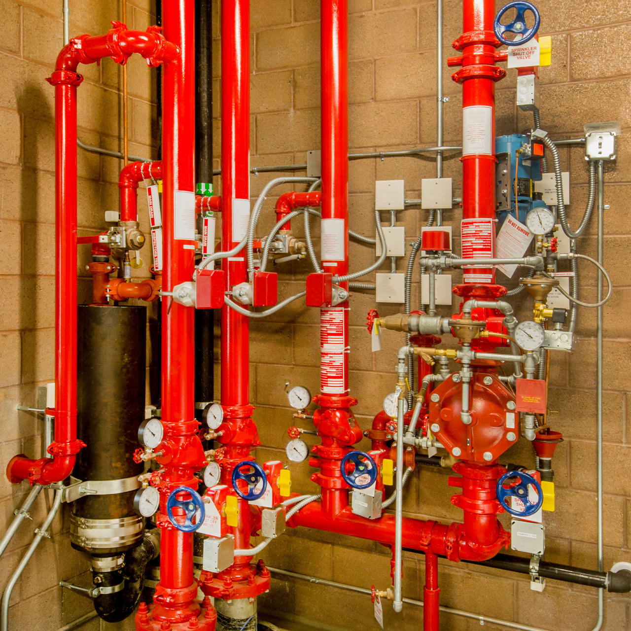 Red Rocks Fire Protection technician on a sprinkler service call